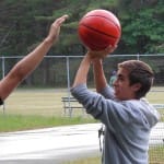 Nico T. playing basketball