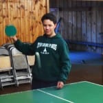 Santiago returning a smash at the Ping Pong Workshop.