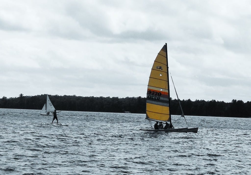 Lake Nokomis is alive with TP sailors, sailboards, kayakers, and swimmers.