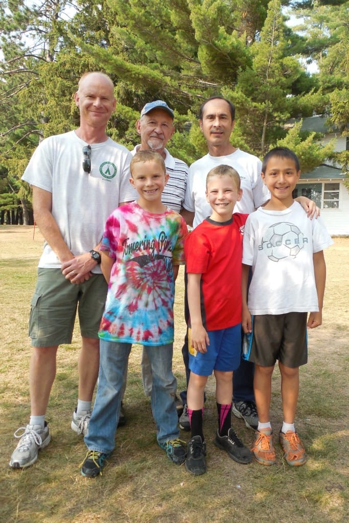 Campers, cousins, fathers, and grandfather. It's a family thing.